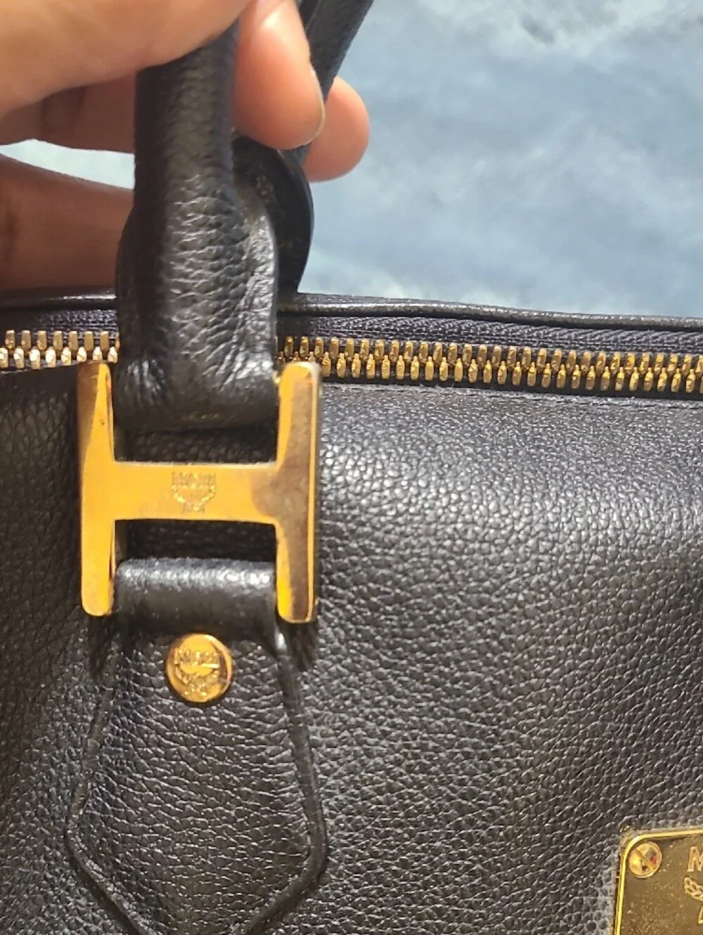MCM Black Leather Bag with Gold Logo Plate
